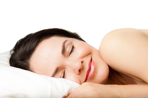 Image of a woman laying on pillow