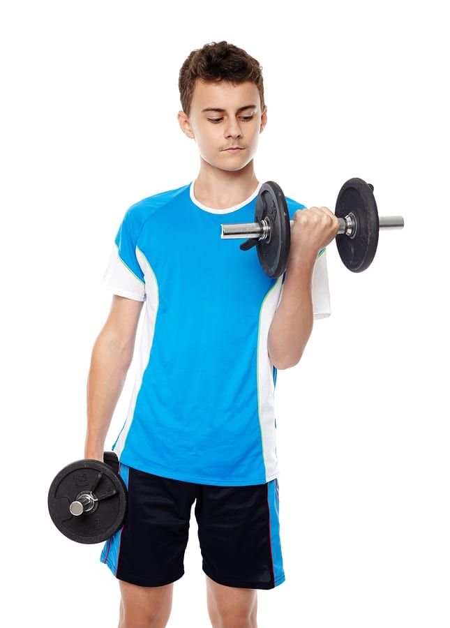 Image of boy lifting weights
