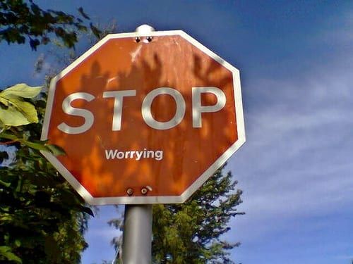 Image of a stop sign with the words "STOP Worrying" on it