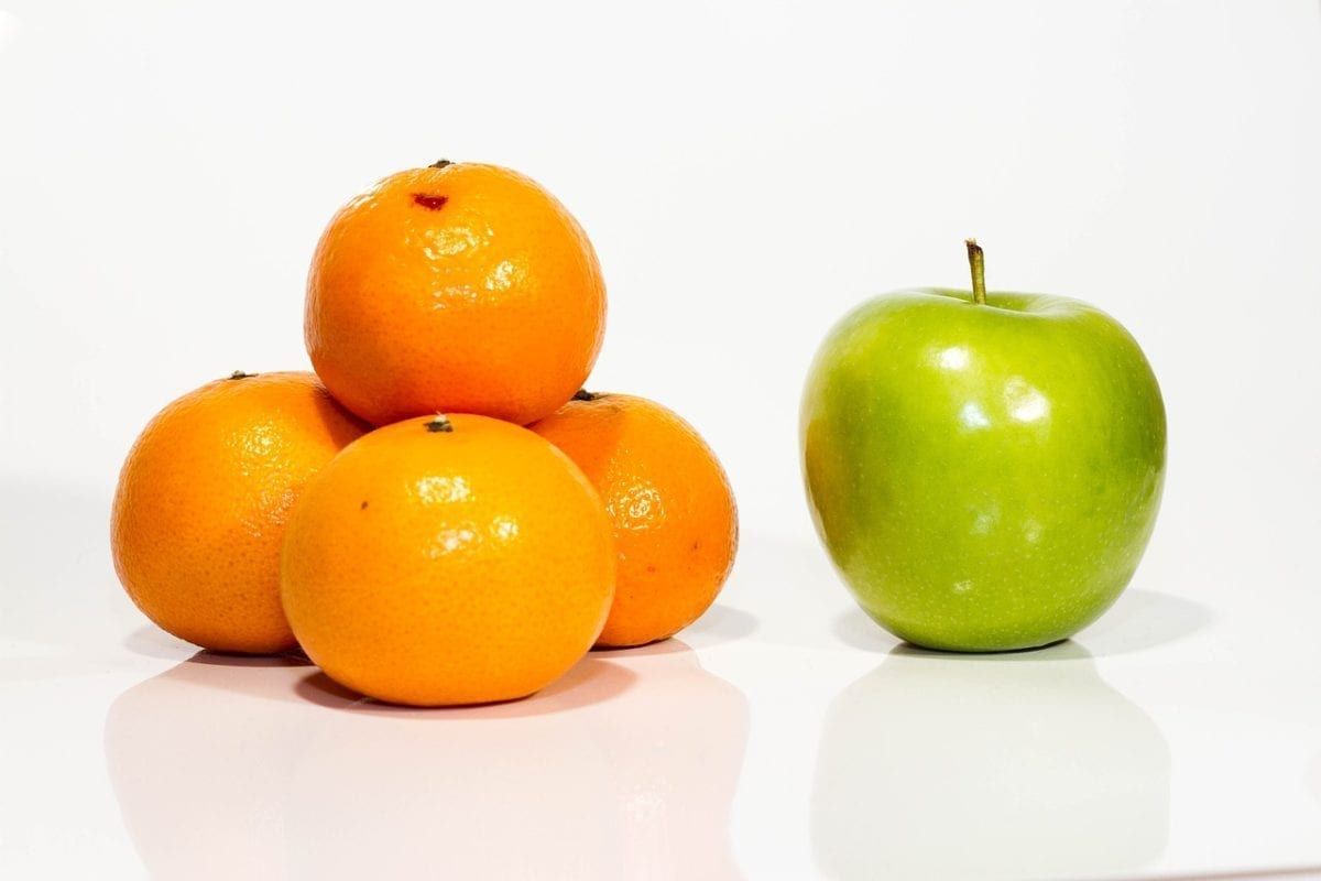 Image of oranges and an apple